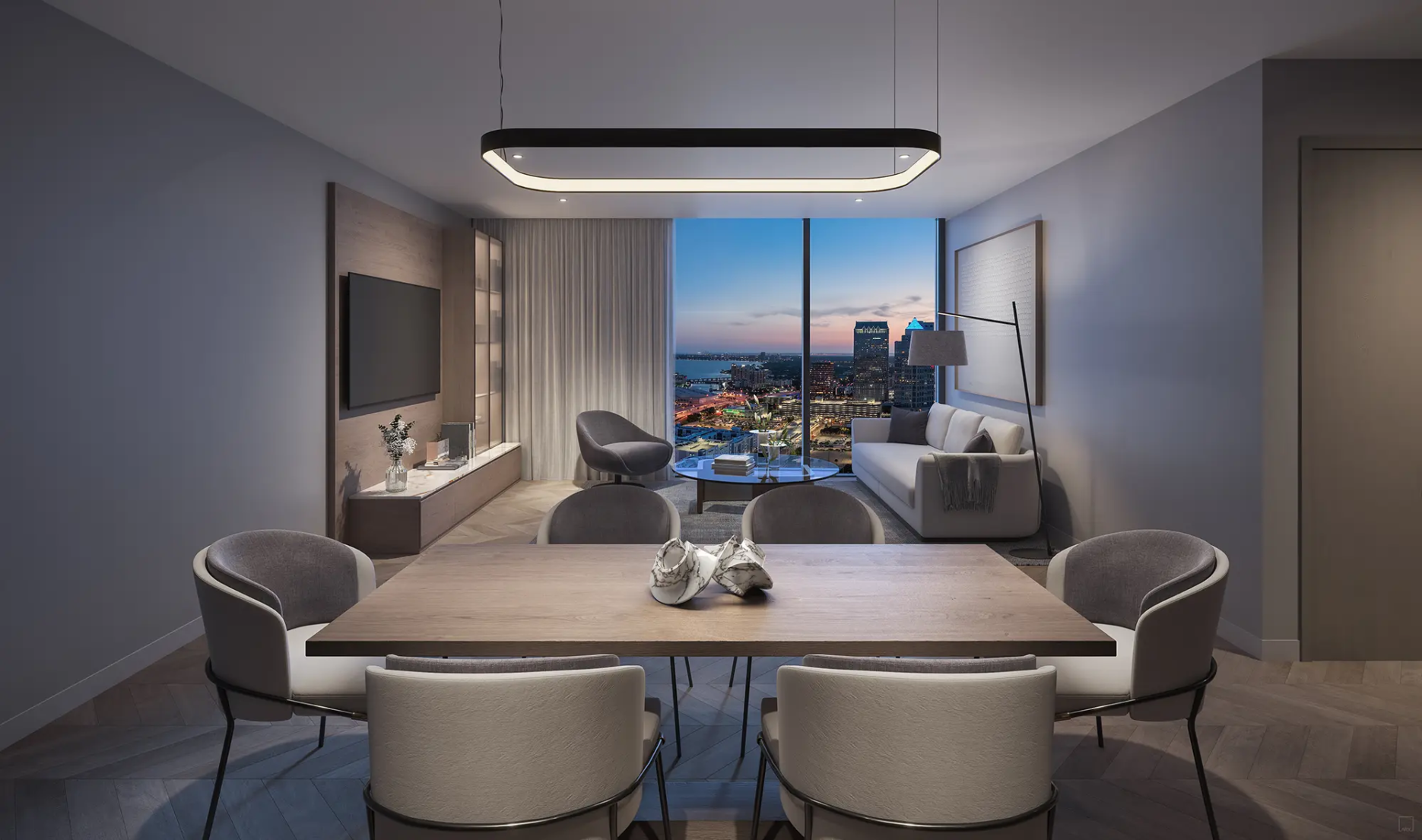 Luxury downtown Tampa condominium dining room with modern furniture and panoramic city views, ideal for upscale urban living.